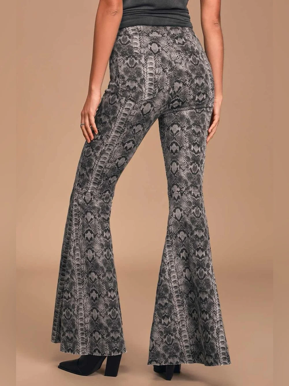 We The Free Free People Just Float On Snake Print Flare Bell Bottom Jeans